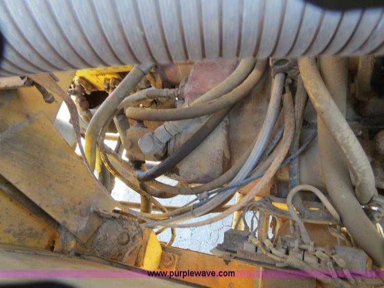 image for item B4701 Gradall G3WD rubber tire excavator