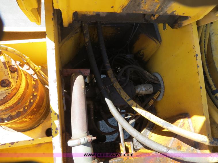 image for item B4701 Gradall G3WD rubber tire excavator