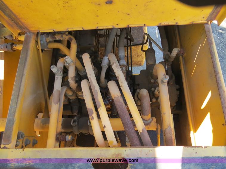 image for item B4701 Gradall G3WD rubber tire excavator