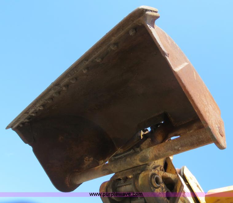 image for item B4701 Gradall G3WD rubber tire excavator