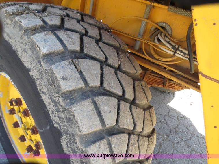 image for item B4701 Gradall G3WD rubber tire excavator