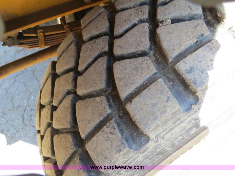 image for item B4701 Gradall G3WD rubber tire excavator