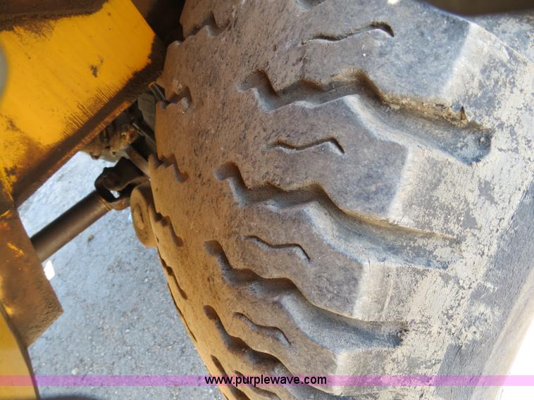 image for item B4701 Gradall G3WD rubber tire excavator