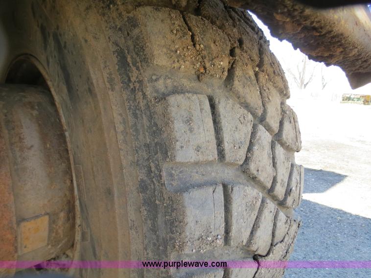 image for item B4701 Gradall G3WD rubber tire excavator