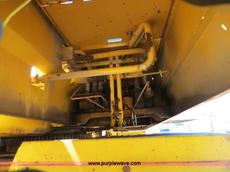 image for item B4701 Gradall G3WD rubber tire excavator