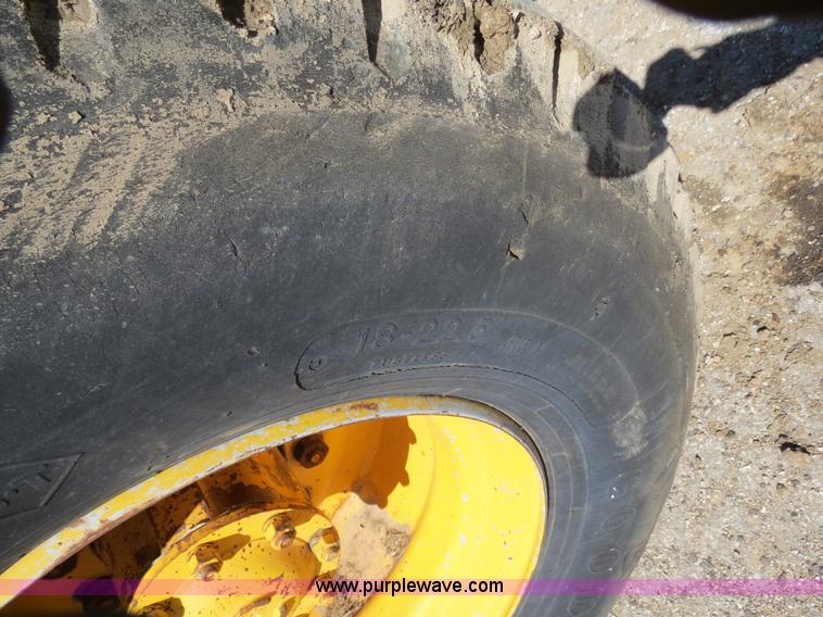 image for item B4701 Gradall G3WD rubber tire excavator