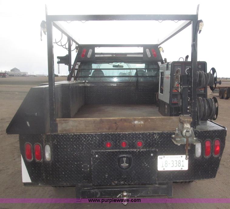 image for item B5424 2006 Ford F350 XL Super Duty CrewCab flatbed service truck