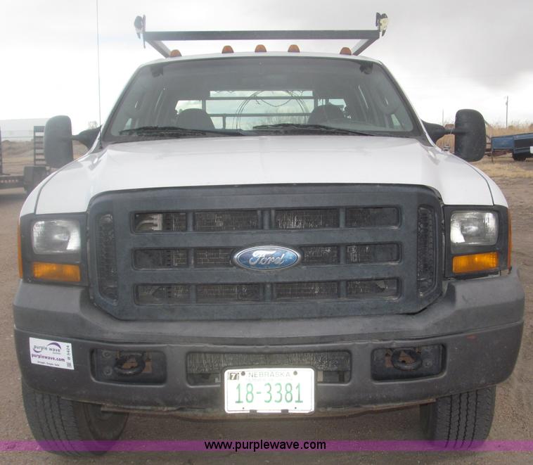 image for item B5424 2006 Ford F350 XL Super Duty CrewCab flatbed service truck