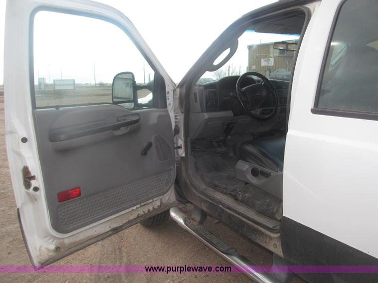 image for item B5424 2006 Ford F350 XL Super Duty CrewCab flatbed service truck