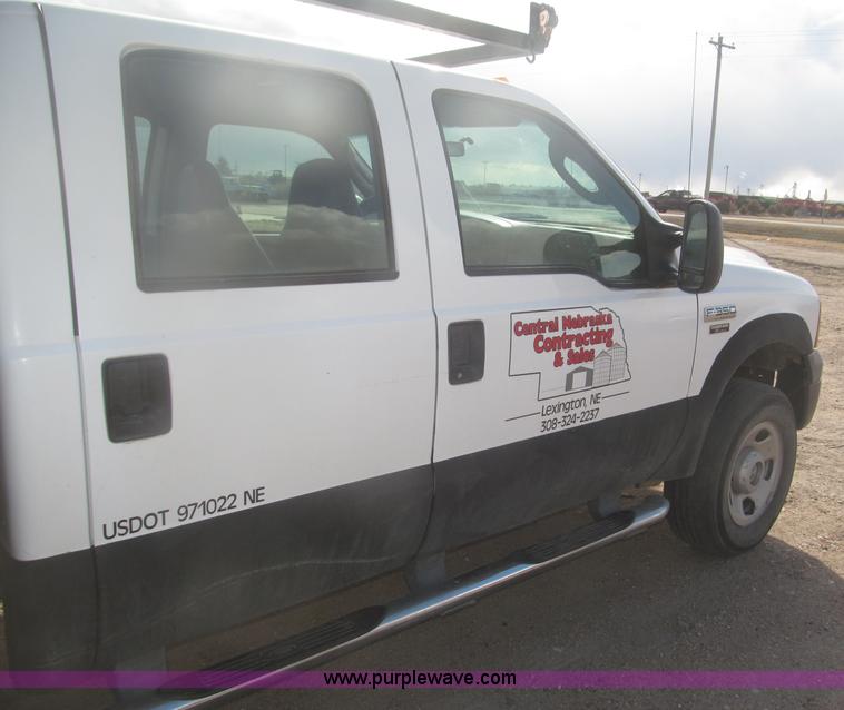 image for item B5424 2006 Ford F350 XL Super Duty CrewCab flatbed service truck