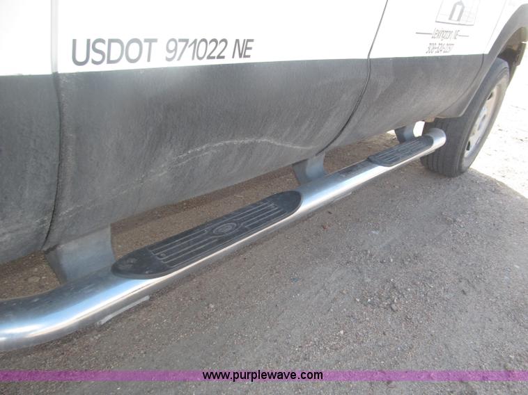 image for item B5424 2006 Ford F350 XL Super Duty CrewCab flatbed service truck