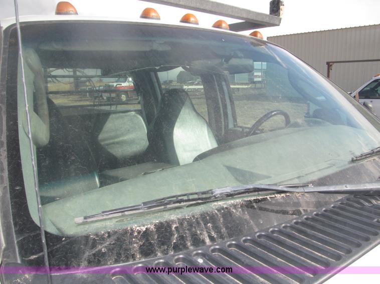 image for item B5424 2006 Ford F350 XL Super Duty CrewCab flatbed service truck