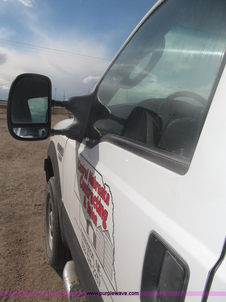 image for item B5424 2006 Ford F350 XL Super Duty CrewCab flatbed service truck