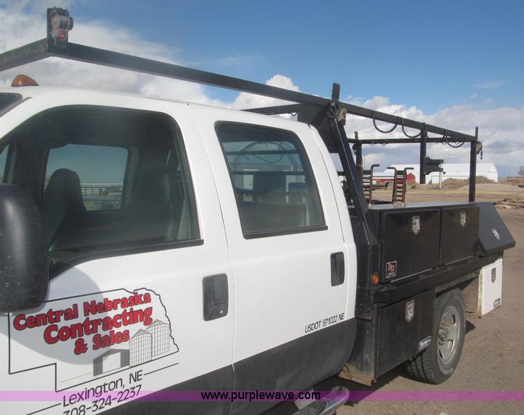 image for item B5424 2006 Ford F350 XL Super Duty CrewCab flatbed service truck
