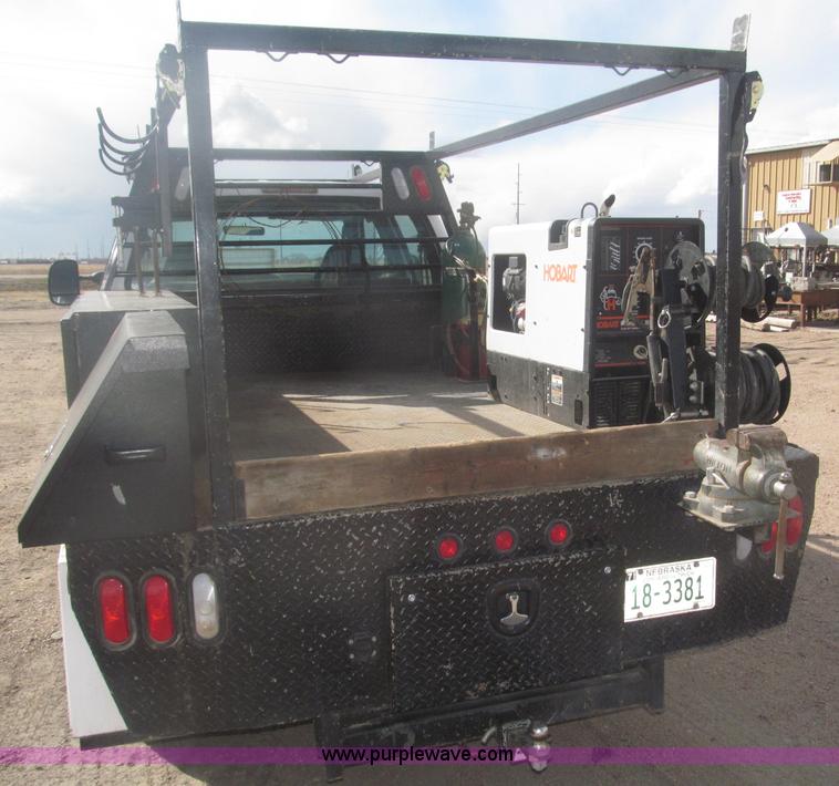 image for item B5424 2006 Ford F350 XL Super Duty CrewCab flatbed service truck