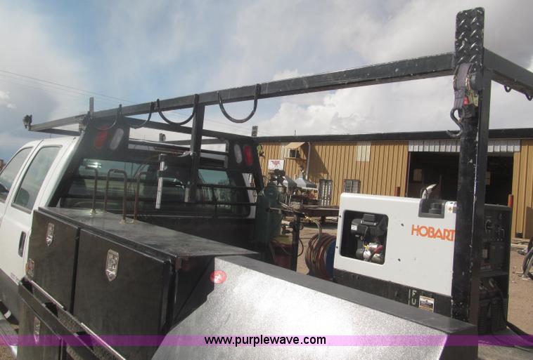 image for item B5424 2006 Ford F350 XL Super Duty CrewCab flatbed service truck