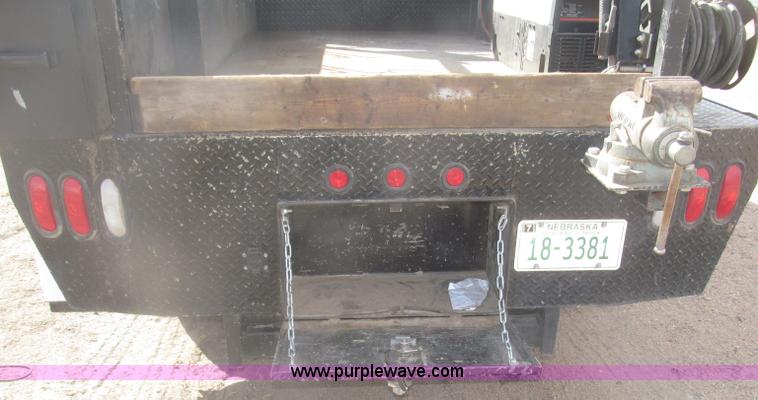 image for item B5424 2006 Ford F350 XL Super Duty CrewCab flatbed service truck