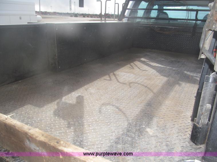 image for item B5424 2006 Ford F350 XL Super Duty CrewCab flatbed service truck