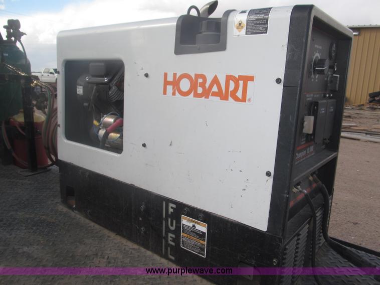 image for item B5424 2006 Ford F350 XL Super Duty CrewCab flatbed service truck