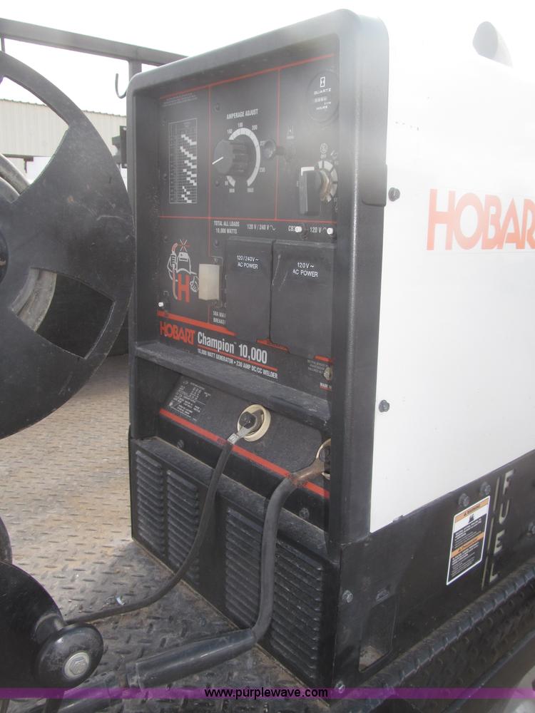 image for item B5424 2006 Ford F350 XL Super Duty CrewCab flatbed service truck