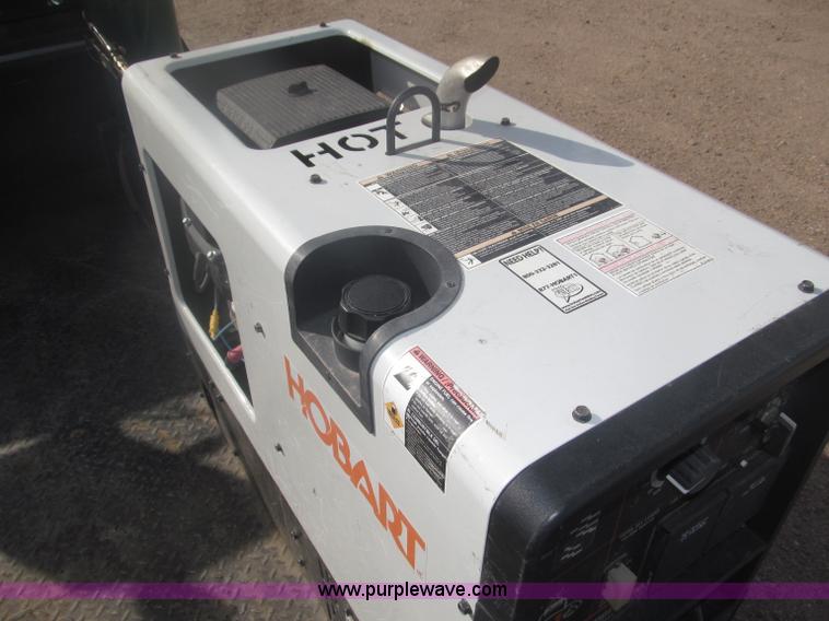 image for item B5424 2006 Ford F350 XL Super Duty CrewCab flatbed service truck