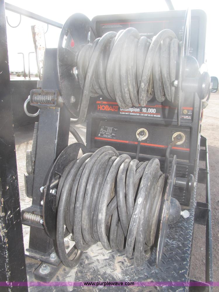 image for item B5424 2006 Ford F350 XL Super Duty CrewCab flatbed service truck