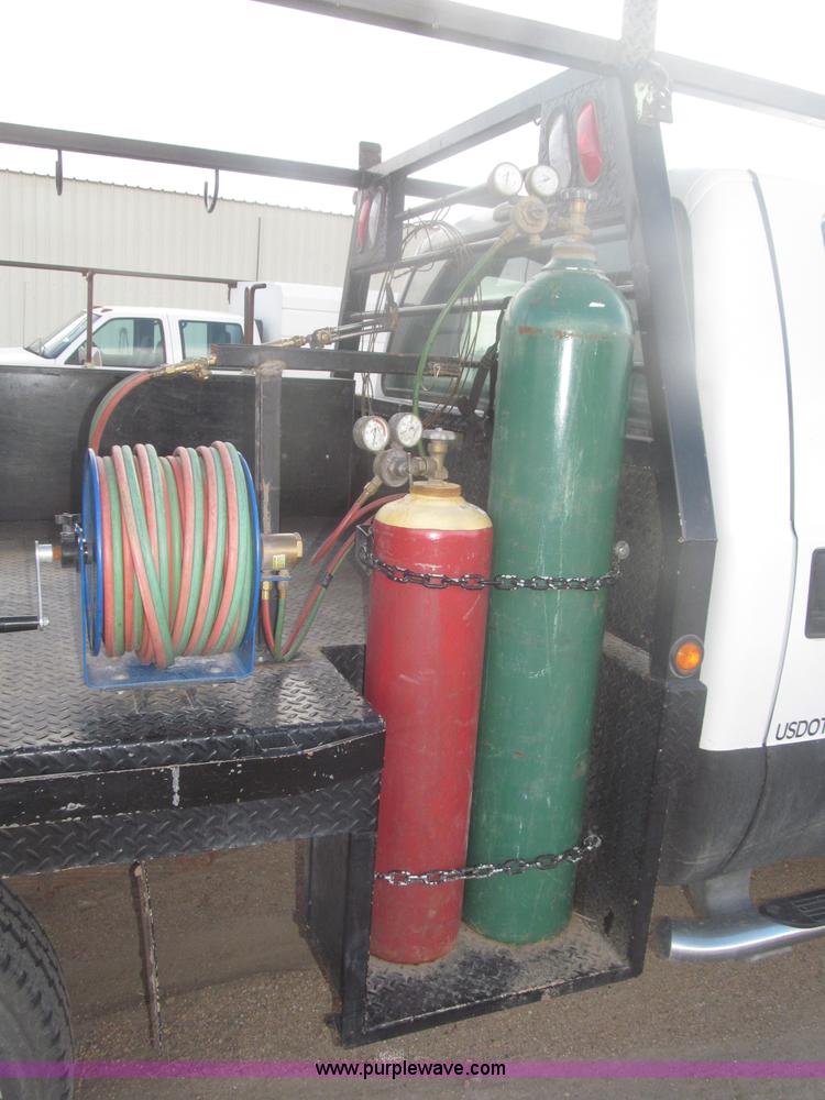 image for item B5424 2006 Ford F350 XL Super Duty CrewCab flatbed service truck