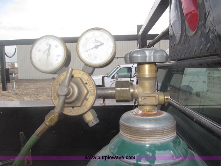 image for item B5424 2006 Ford F350 XL Super Duty CrewCab flatbed service truck