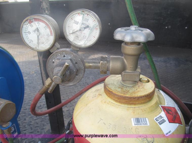 image for item B5424 2006 Ford F350 XL Super Duty CrewCab flatbed service truck