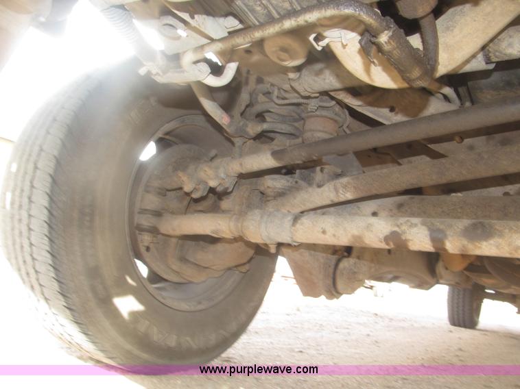 image for item B5424 2006 Ford F350 XL Super Duty CrewCab flatbed service truck