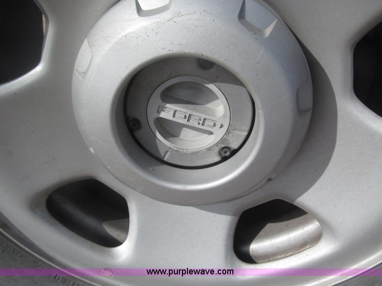 image for item B5424 2006 Ford F350 XL Super Duty CrewCab flatbed service truck