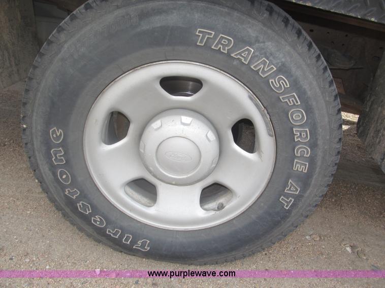 image for item B5424 2006 Ford F350 XL Super Duty CrewCab flatbed service truck