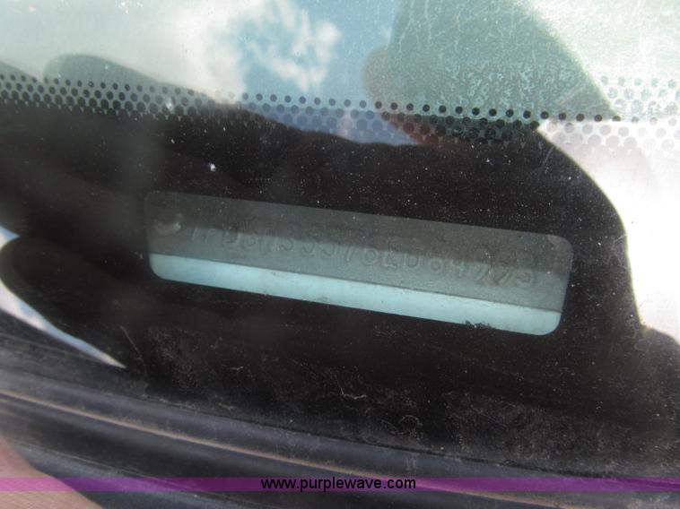 image for item B5424 2006 Ford F350 XL Super Duty CrewCab flatbed service truck