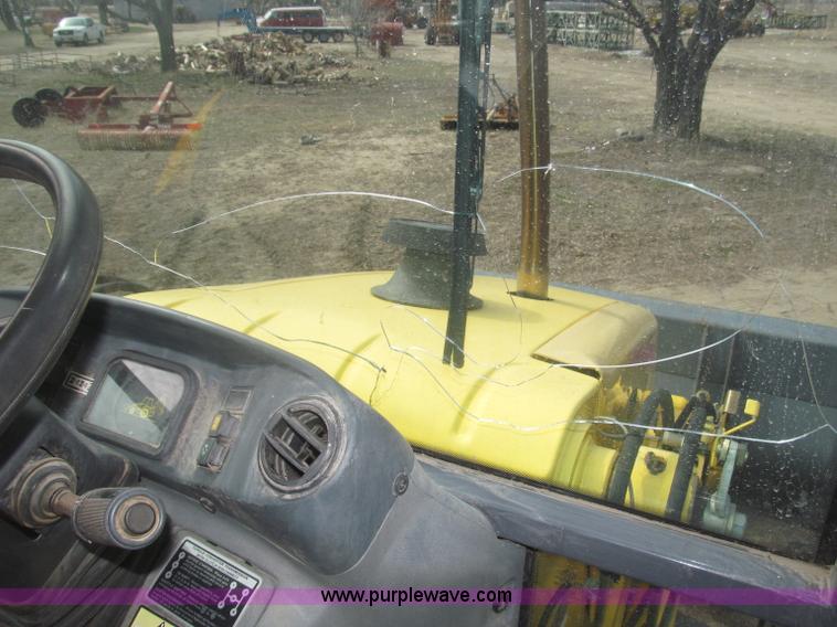 image for item B5442 2001 New Holland LB110 backhoe