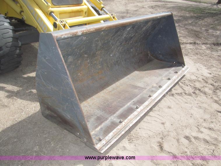 image for item B5442 2001 New Holland LB110 backhoe