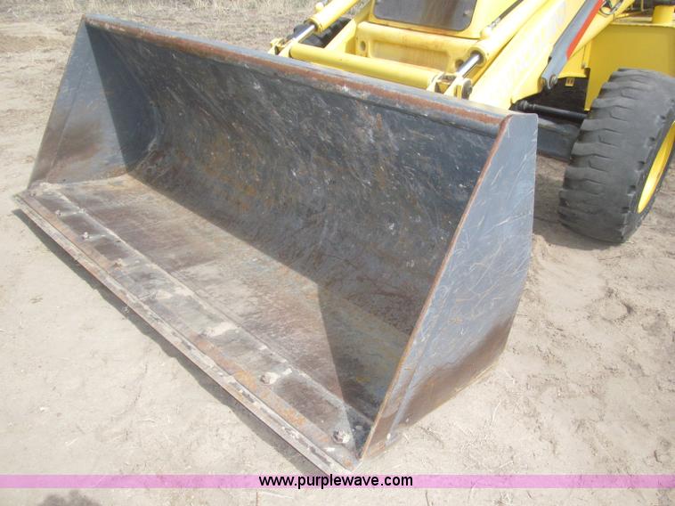 image for item B5442 2001 New Holland LB110 backhoe