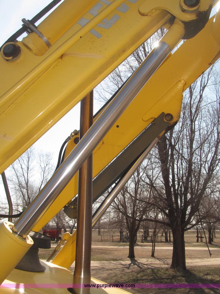 image for item B5442 2001 New Holland LB110 backhoe