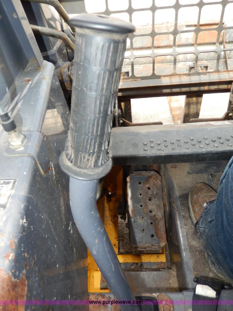 image for item D8012 1999 New Holland LS170 skid steer