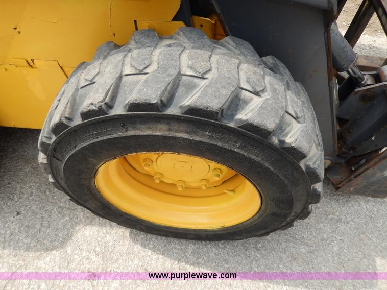 image for item D8012 1999 New Holland LS170 skid steer