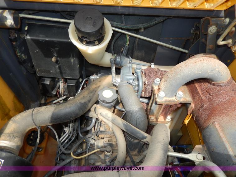 image for item D8012 1999 New Holland LS170 skid steer