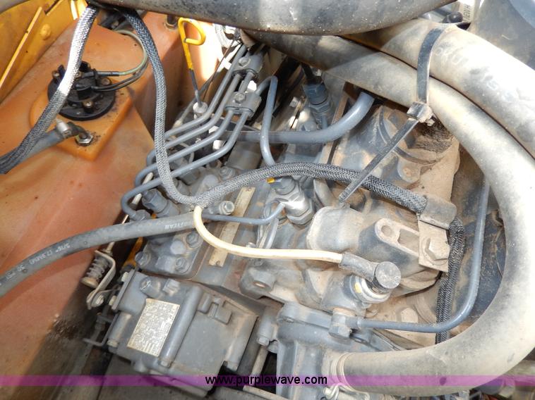 image for item D8012 1999 New Holland LS170 skid steer