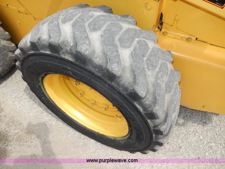 image for item D8012 1999 New Holland LS170 skid steer