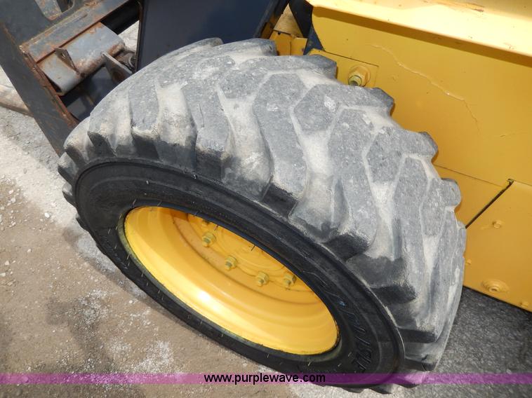 image for item D8012 1999 New Holland LS170 skid steer