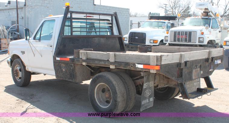 image for item E3000 1994 Ford F350 XL flatbed truck
