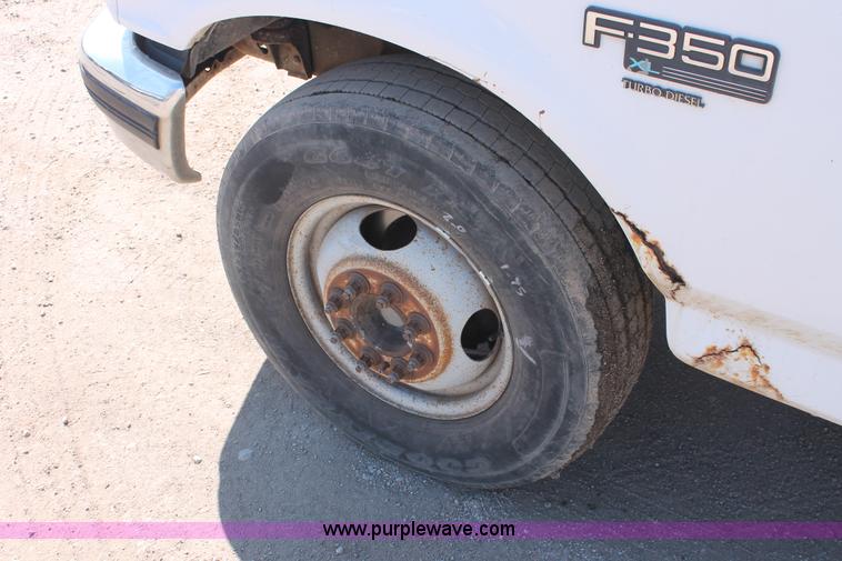 image for item E3000 1994 Ford F350 XL flatbed truck