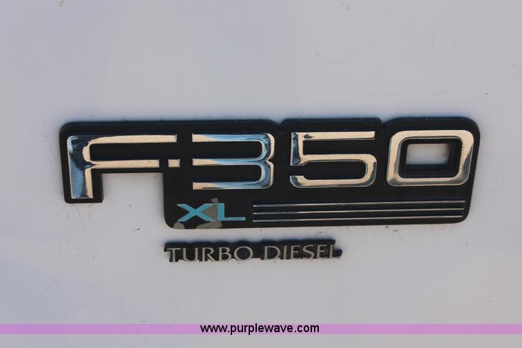 image for item E3000 1994 Ford F350 XL flatbed truck
