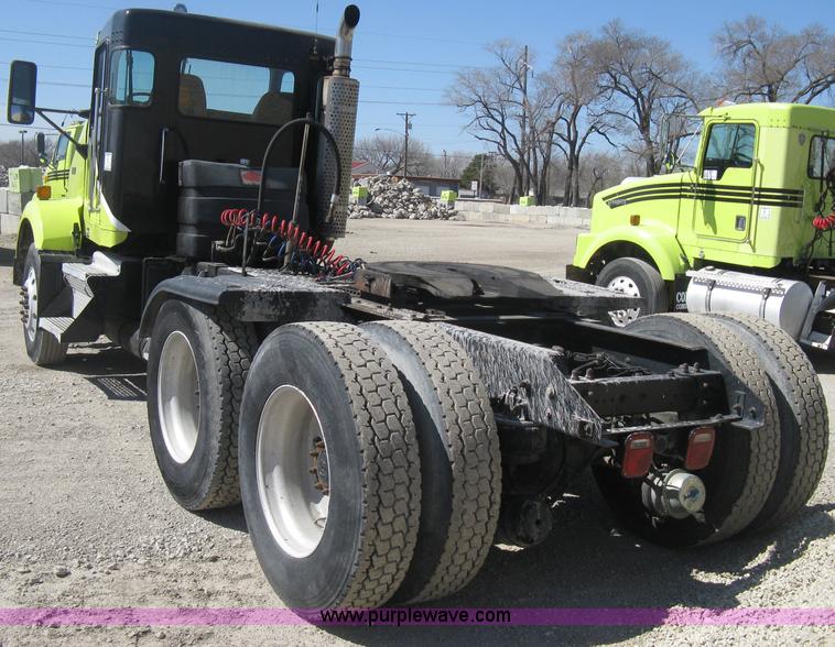 image for item E3302 1998 Kenworth T802SH semi truck