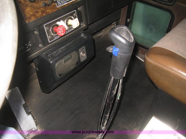 image for item E3302 1998 Kenworth T802SH semi truck