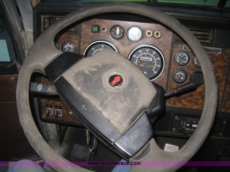 image for item E3302 1998 Kenworth T802SH semi truck