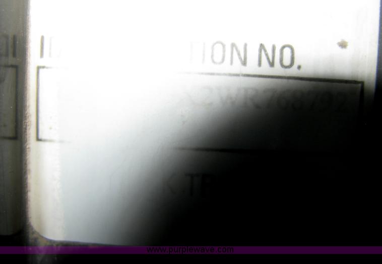 image for item E3302 1998 Kenworth T802SH semi truck